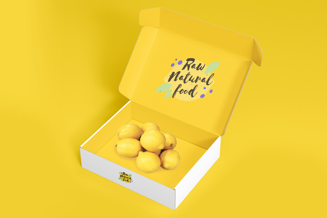 Boite automontante jaune Raw Natural Food ouverte lettering manuscrit couvercle et citrons. Sprint24.
